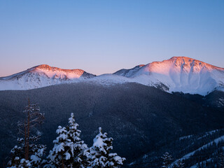 Ski slopes and mountains at sunset in Winter Park Colorado