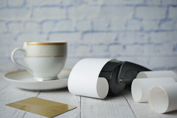 POS machine and long roll paper on blue .