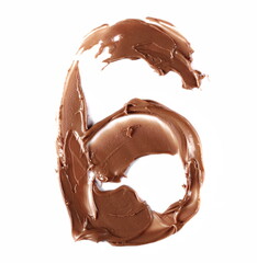 Cream chocolate spreading in shape number 6, six isolated on white, top view