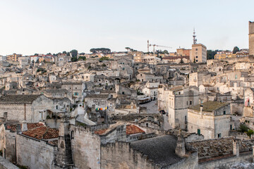 Fototapeta na wymiar View at the old town - Sasso Caveoso - of Matera during sunrise Basilicata, Italy - Euope
