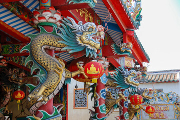Details of the dragon decoration and lanterns of a Chinese temple in Ayutthaya, Thailand