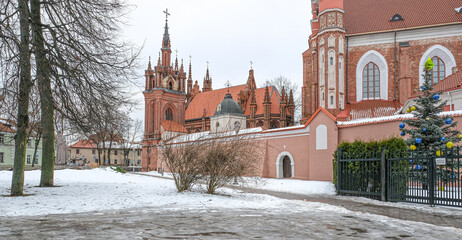 Gothic Church of St. Anne and Church of St. Francis and St. Bernardine ensemble in winter as seen...