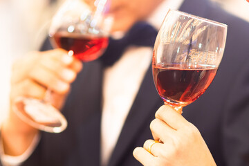 wedding party event people cheering each other with champagne and wine in dinner