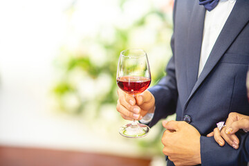 wedding party event people cheering each other with champagne and wine in dinner