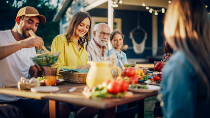 Big Family and Friends Celebrating Outside in a Backyard at Home. Diverse Group of Children, Adults...
