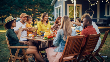 Parents, Children, Relatives and Friends Having an Open Air Vegetarian Dinner in Their Backyard....