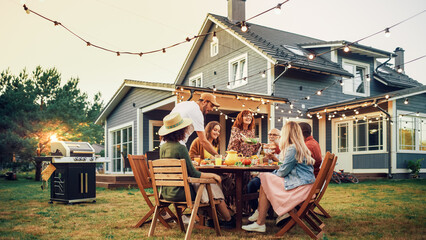 Parents, Children, Relatives and Friends Having an Open Air Barbecue Dinner in Their Backyard. Old and Young People Talk, Chat, Have Fun, Eat and Drink. Garden Party Celebration in a Backyard.