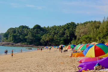 Beautiful colorful umbrellas on the beach of Thailand