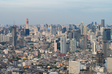 Fototapeta na wymiar Aerial view of Bangkok Downtown Skyline, Thailand. Financial district and business centers in smart urban city in Asia. Skyscraper and high-rise buildings.