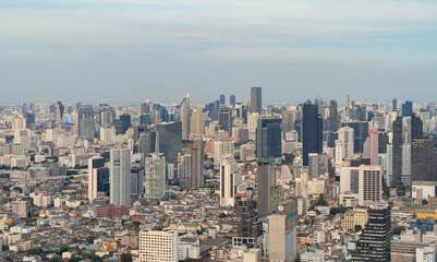 Fototapeta premium Aerial view of Bangkok Downtown Skyline, Thailand. Financial district and business centers in smart urban city in Asia. Skyscraper and high-rise buildings.