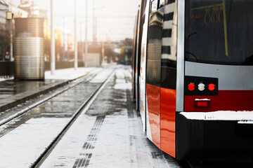Modern red city tram in Vienna Austria. Public Streetcar transportation