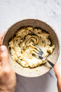 Homemade garlic butter being prepared in a bowl