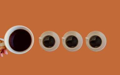 terracotta background with coffee cups