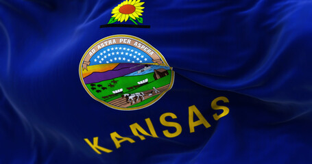 Close-up view of Kansas state flag waving in the wind