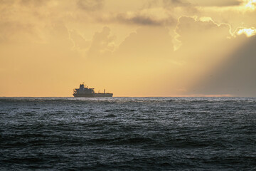 Commercial ship at sunset