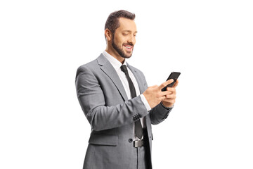 Smiling professional man looking at a smartphone