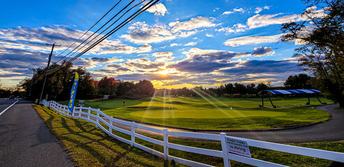 sunset over the fence