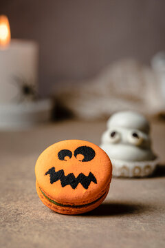 Jack o lantern macaron over table for Halloween