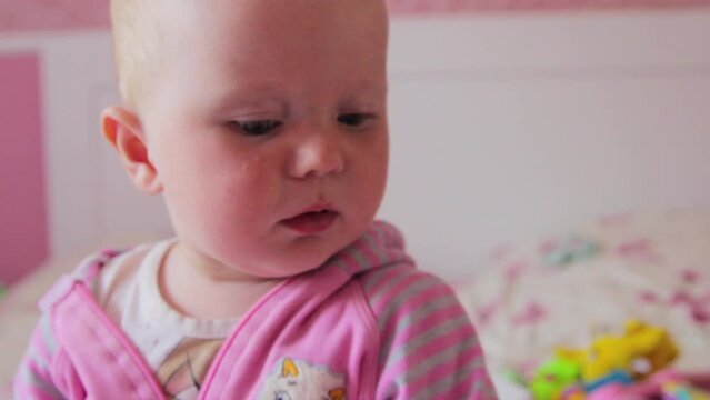 baby cooing to the camera,The cheerful baby speaks, sings and cries, the baby makes sounds with his lips