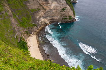 A View on Kelingking Beach from The Top, T-Rex Bay, Small Secluded White Sandy Beach, Nusa Penida...