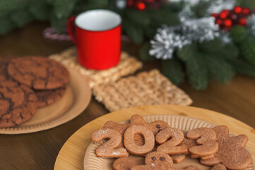Merry Christmas and New Year. Gingerbread 2023 in kitchen close-up