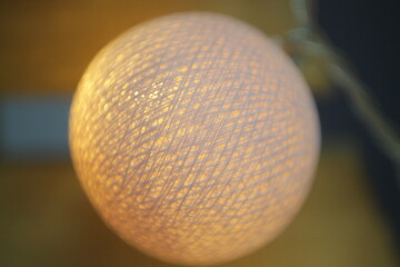 cozy light with threads on macro