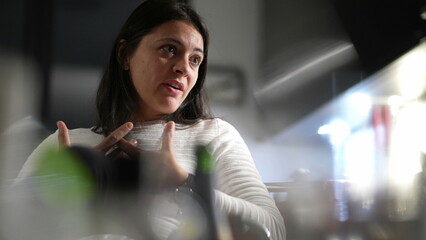 Candid woman in conversation at night, casual real life3