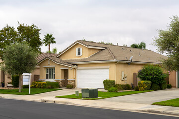 Fototapeta na wymiar Suburban single family residence exterior view, oasis community, Menifee, California, USA