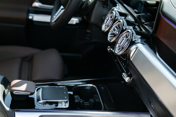Fototapeta na wymiar ventilation system in a famous expensive premium car close-up