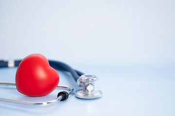 medical stethoscope and heart on blue background and copy space for insurance planning, protection...