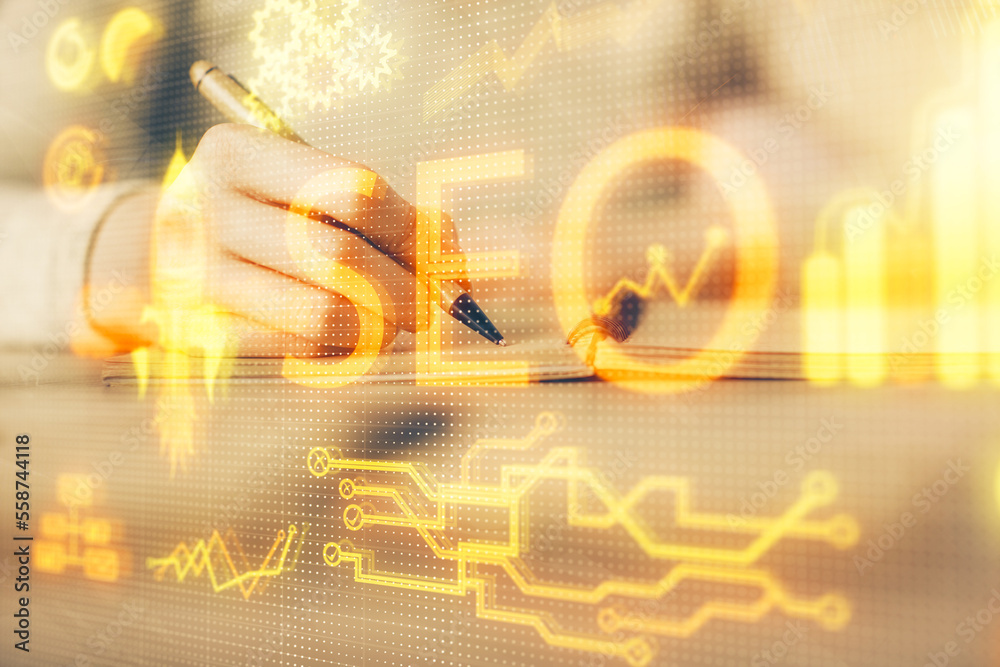 Poster multi exposure of woman's hands making notes with seo icon. concept of search engine optimization