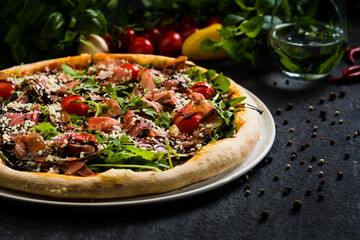 Pizza with prosciutto ham