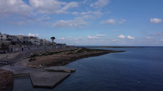 Mediterranean coastline, Malta island, Qawra. Aerial view, midday. High quality FullHD footage