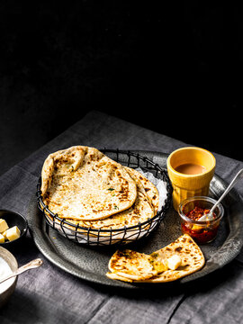 Flatlay of stuffed Aloo paratha Indian potato flatbread