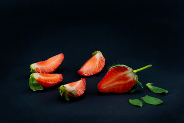 Fototapeta na wymiar strawberries on black background