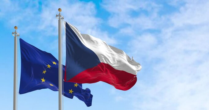 The flags of Czech Republic and the European Union waving together on a clear day