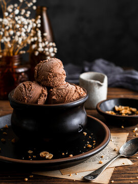 Chocolate ice cream in a black bowl