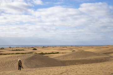 Fototapeta na wymiar Evening Desert walk on sand dunes in Gran Canaria