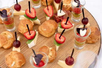 buffet table with snacks and fruits