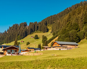 Obraz premium Beautiful alpine summer view at the famous Kleinwalsertal valley, Mittelberg, Vorarlberg, Austria
