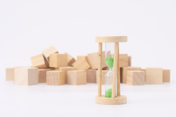 Hourglass on color background. Time management concept