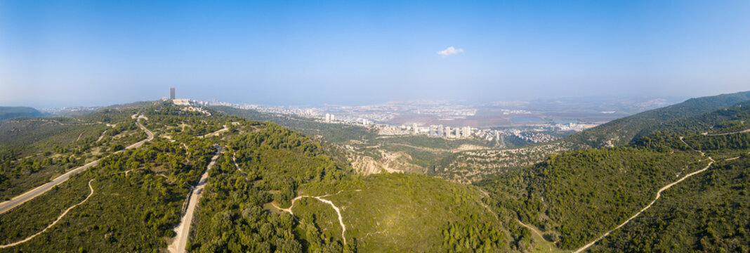 Aerial view of a road in woodlands, Carmel Forest, Haifa, Israel.