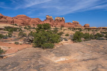 hiking the chesler park loop trail in the needles in canyonlands national park, usa