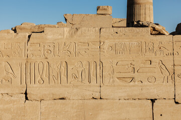 Hieroglyphics and reliefs at the Karnak Temple in Luxor, Egypt