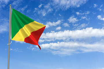 Republic of the Congo Flag Over Blue Sky Background. 3D Illustration