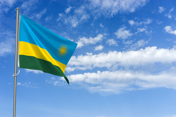 Republic of Rwanda Flag Over Blue Sky Background. 3D Illustration