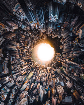 Aerial 360 degrees view Hong Kong downtown at sunset, China.
