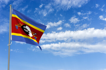 Kingdom of Eswatini Flag Over Blue Sky Background. 3D Illustration