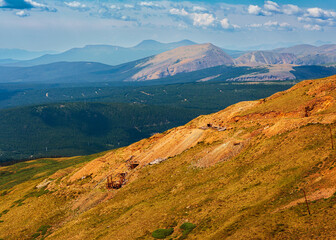 Fototapeta premium Abandoned Morning Star mine complex on the east flank of Mount Bross at 12,598 elevation, Park County, Colorado with Rocky Mountains in background