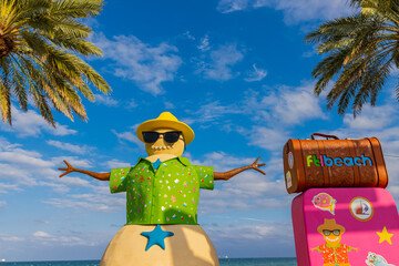 Sand Sculpture Snowman on Vacation on Las Olas Beach, Fort Lauderdale Beach, Florida, USA © Billy McDonald